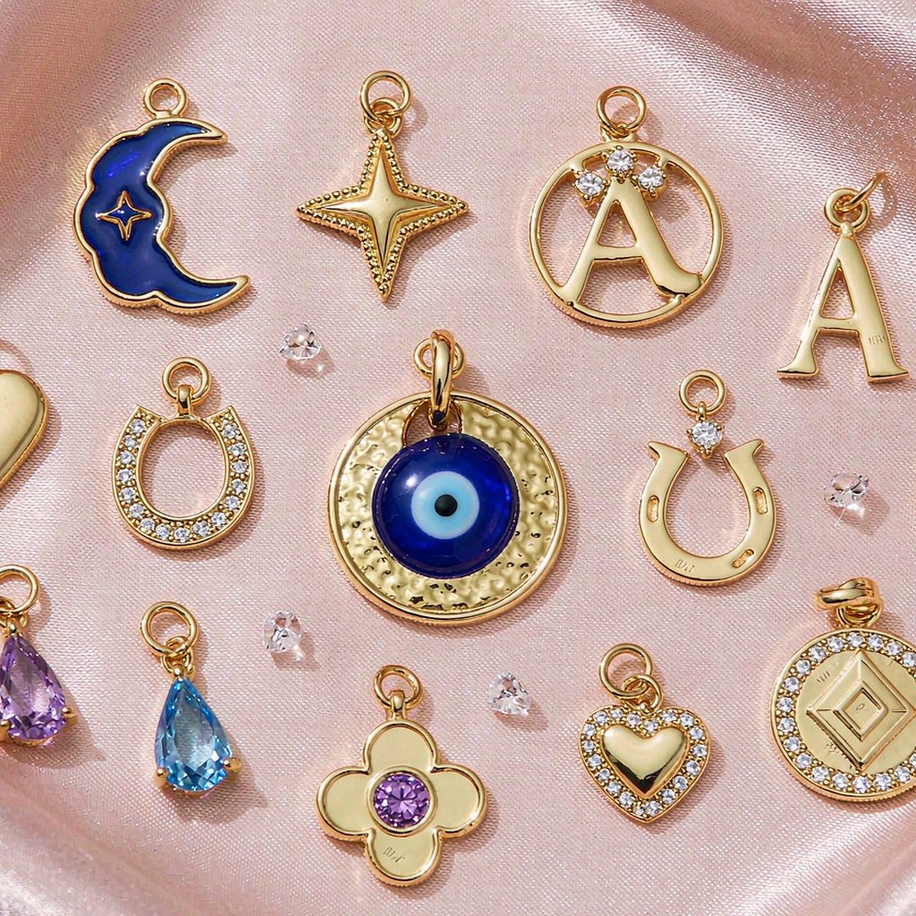 Gold and gemstone charms